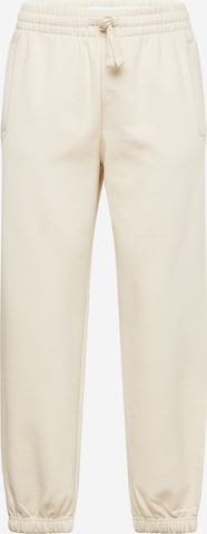 Tapered Pantaloni di TOPMAN in beige: frontale