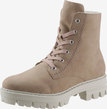 Bottines à lacets Rieker en beige : devant