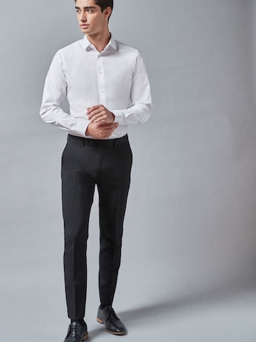 Next Pleated Pants in Black: front