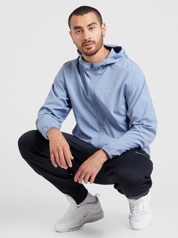 NIKE Training Jacket 'Form' in Blue