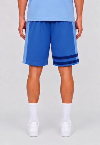 Unfair Athletics Regular Trousers 'DMWU' in Blue