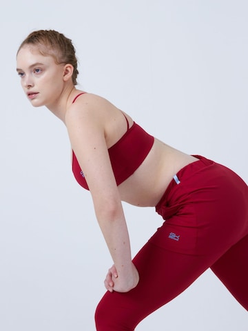 Jupe de sport '2-in-1 Tennis Skirt with Leggings' SPORTKIND en rouge