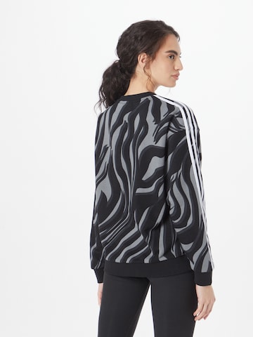 Sweat-shirt 'Abstract Allover Animal Print' ADIDAS ORIGINALS en noir