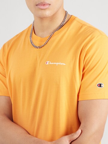 Maglietta di Champion Authentic Athletic Apparel in arancione