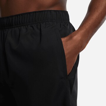 NIKE Regular Workout Pants in Black