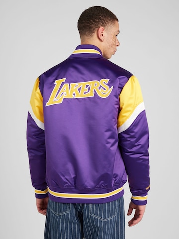 Mitchell & Ness Prehodna jakna 'NBA' | vijolična barva