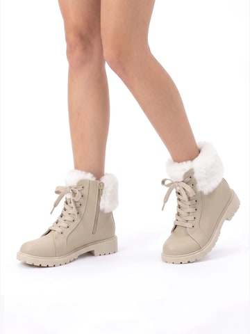 TorWeit Enkellaarsje 'Fluffy Lace Up Winter Boots' in Wit