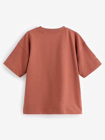 T-Shirt Next en orange