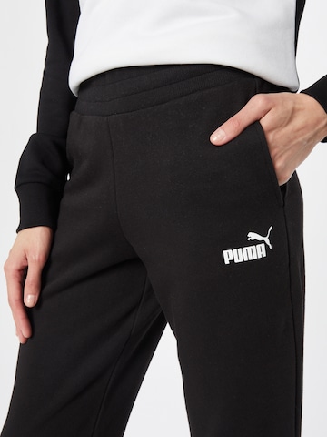 PUMA تقليدي سروال رياضي 'Essential' بلون أسود
