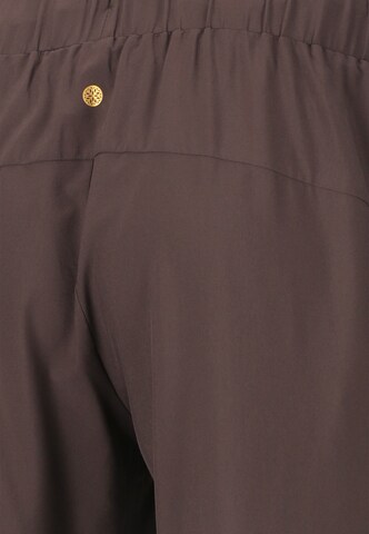 Athlecia Tapered Sports trousers 'Austberg' in Brown