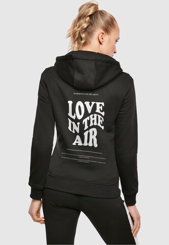 Merchcode Sweatshirt 'Love In The Air' in Zwart