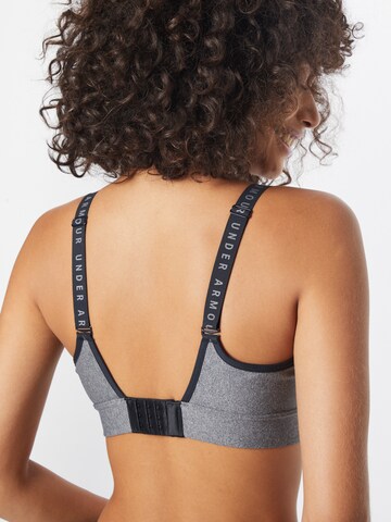 Medium Support Soutien-gorge de sport 'Infinity' UNDER ARMOUR en gris