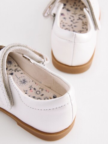 Next - Bailarina en blanco