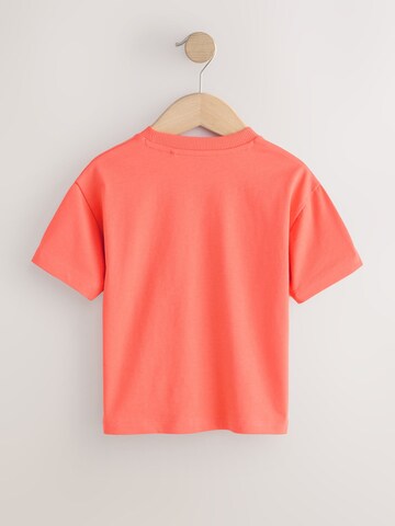 T-Shirt Next en orange