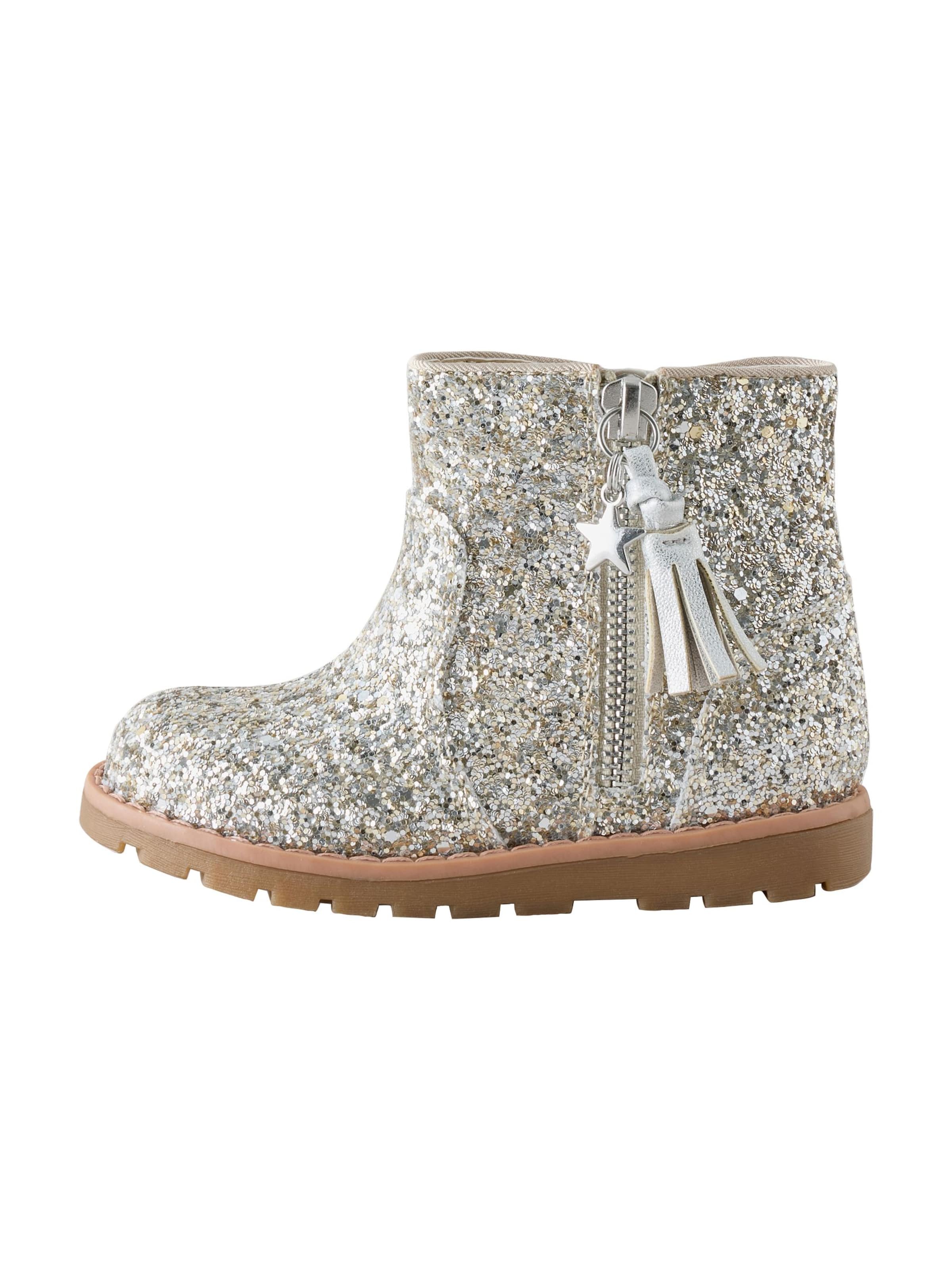 Next - Botas en plata: frente
