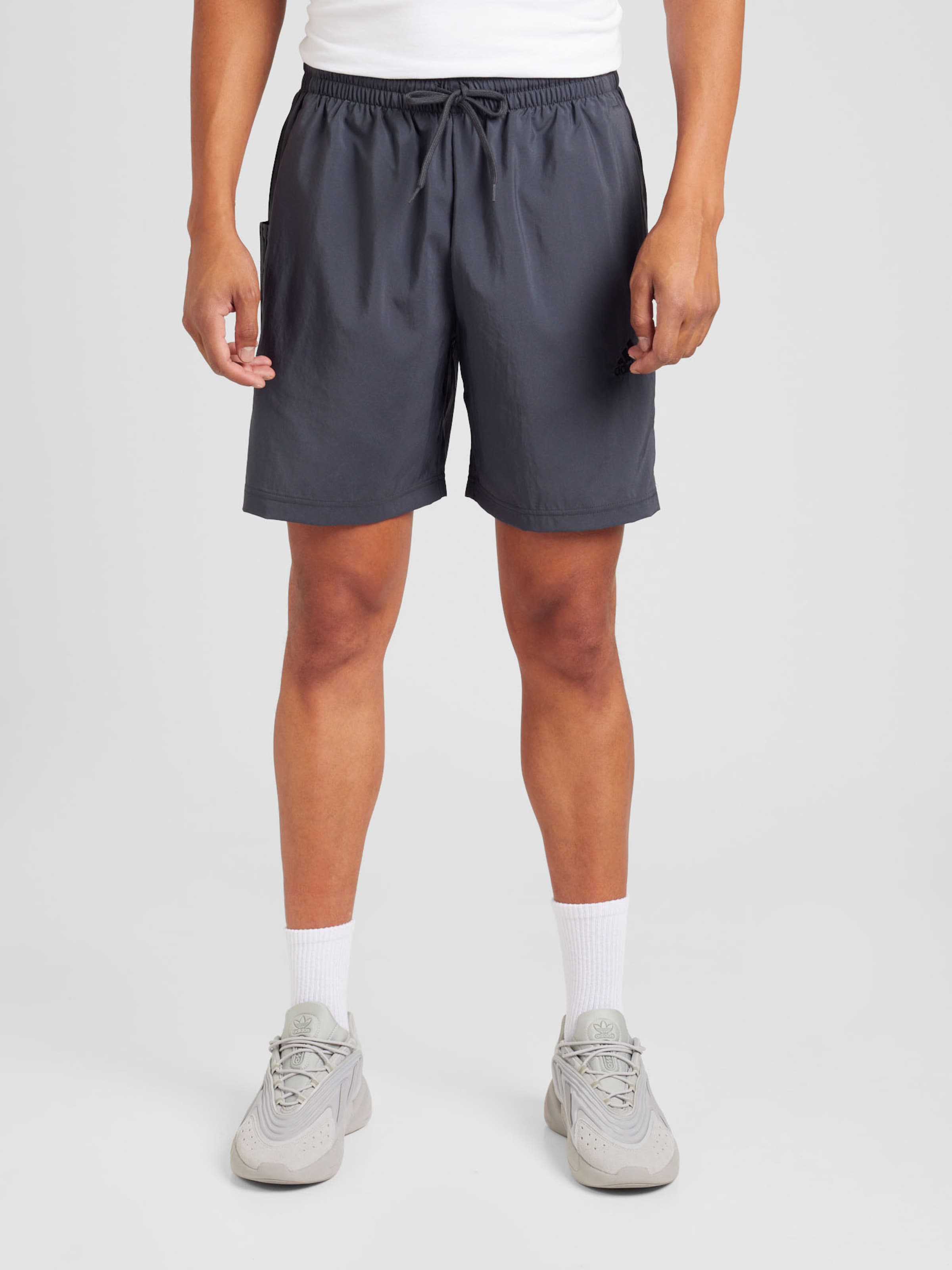 Regular Pantalon de sport Essentials Chelsea ADIDAS SPORTSWEAR en Gris Fonce ABOUT YOU