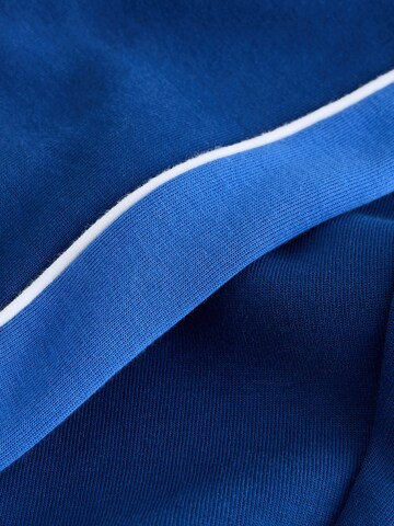 Next Zúžený Kalhoty – modrá