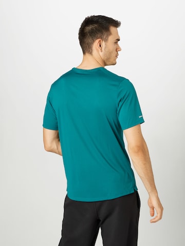 NIKERegular Fit Tehnička sportska majica 'Miler' - plava boja