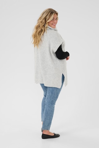 Cape 'Mala' KAFFE CURVE en gris