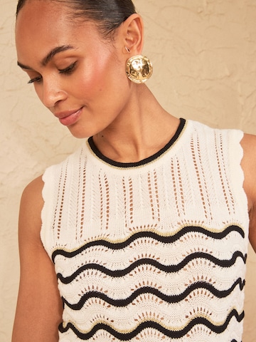 Top in maglia di love & roses in bianco