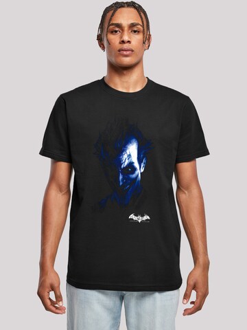 F4NT4STIC Shirt 'DC Comics Batman Arkham Asylum Joker Face Distress' in Zwart: voorkant