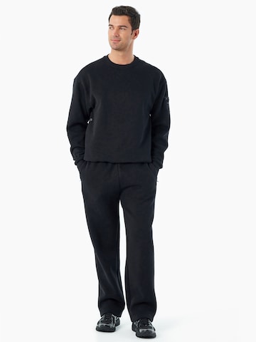 Organication Loosefit Hose in Schwarz