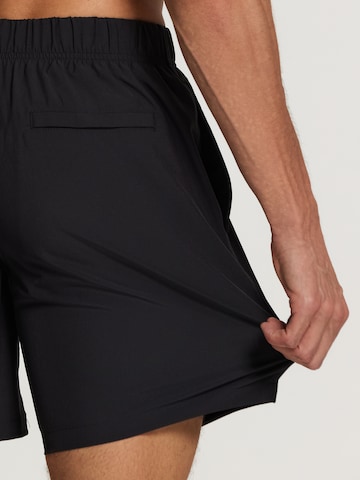 Shiwi Zwemshorts 'easy mike solid 4-way stretch' in Zwart