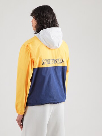 Nike Sportswear Přechodná bunda 'MARINA' – žlutá