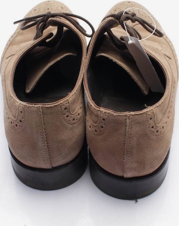 Tod's Flats & Loafers in 43 in Brown