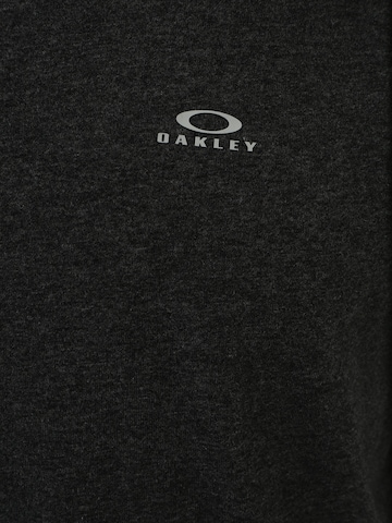 OAKLEY Funkční tričko – šedá