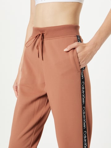 Pantalon de sport Calvin Klein Performance en marron