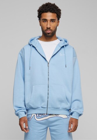 Veste de survêtement Karl Kani en bleu : devant