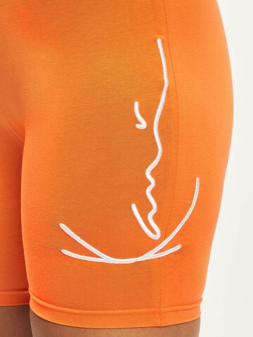 Karl Kani Skinny Leggings in Oranje