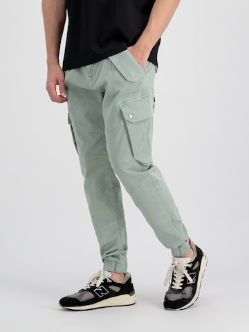 ALPHA INDUSTRIES Tapered Cargo trousers in Green: front