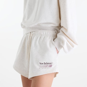 Loosefit Pantaloni 'Trackside' di new balance in beige