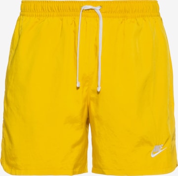 Nike Sportswear Spodnie 'Essentials' w kolorze żółty: przód