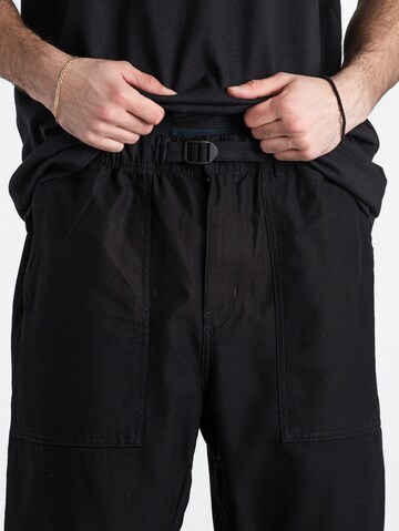 Carhartt WIP Wide leg Pants ' Hayworth' in Black