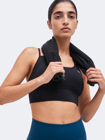 ICANIWILL Korzetová Sportovní podprsenka 'Define' – černá