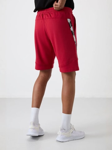 Regular Pantalon Tommy Life en rouge