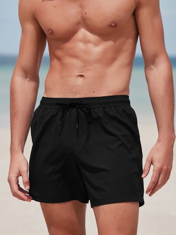 Next Swimming shorts 'Essential' in Black: front