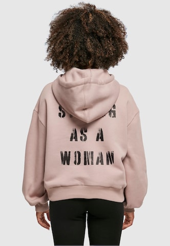 Sweat-shirt 'WD - Strong As A Woman' Merchcode en rose : devant