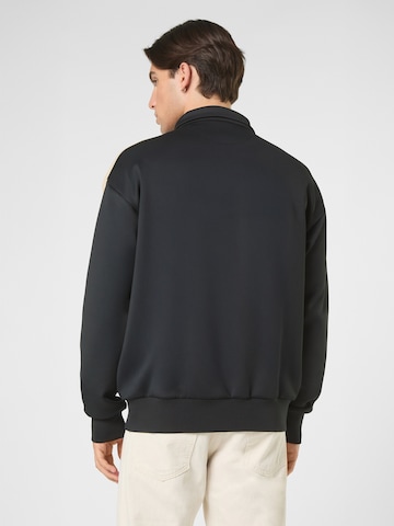 FILA - Sudadera con cremallera 'VAIANO relaxed taped track jacket' en negro