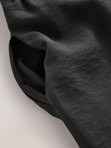 Combinaison Next en noir