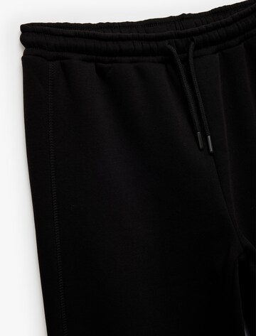 Koton Wide Leg Hose in Schwarz