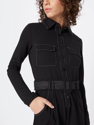 Tuta jumpsuit di Warehouse in nero