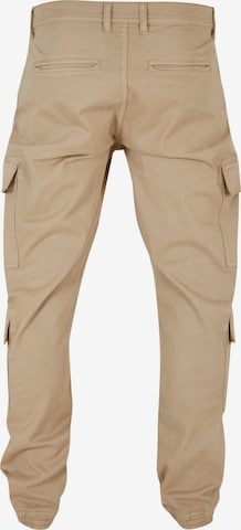 Effilé Pantalon cargo Urban Classics en beige