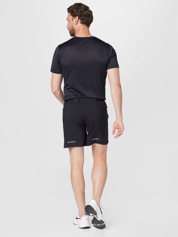 Regular Pantalon de sport 'Road' ASICS en noir