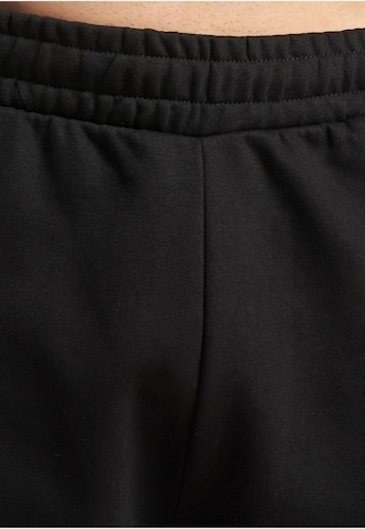 Ecko Unlimited Tapered Trousers in Black