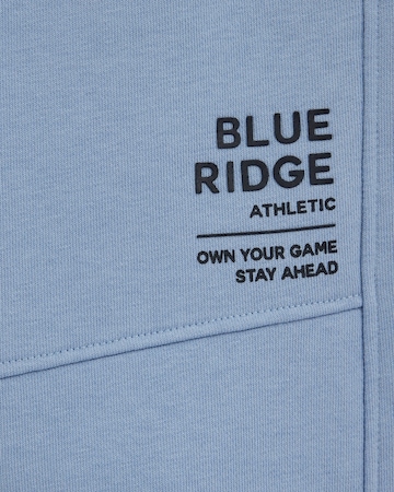 WE Fashion Regular Housut värissä sininen