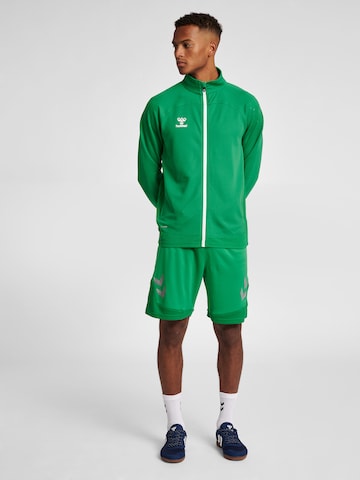 Veste de survêtement 'Lead' Hummel en vert